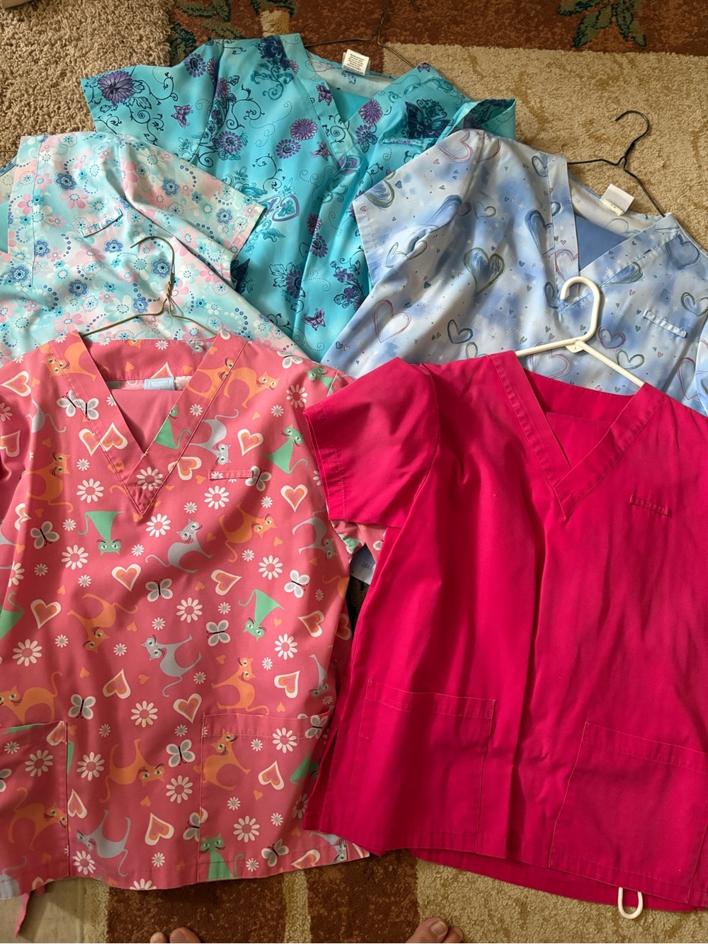 5 Scrub sets (shirt and pants) + 2 scrub tops (tops only)